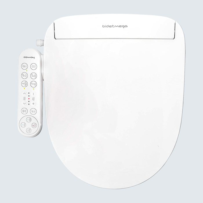 White bidet seat with control panel, featuring multiple buttons and indicators, on a light background. Text reads 