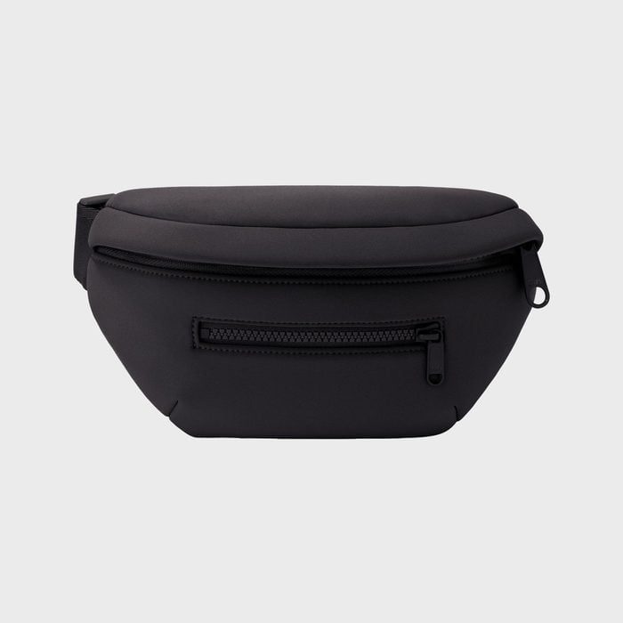 A black fanny pack with two zippers lies against a plain gray background.