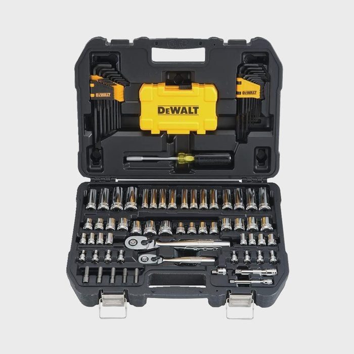 A DeWalt tool kit is open, displaying sockets, ratchets, and screwdrivers neatly organized in a sturdy black case.