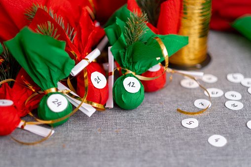 Small gifts surprises advent calendar for children. Happy waiting and preparation Christmas and new year