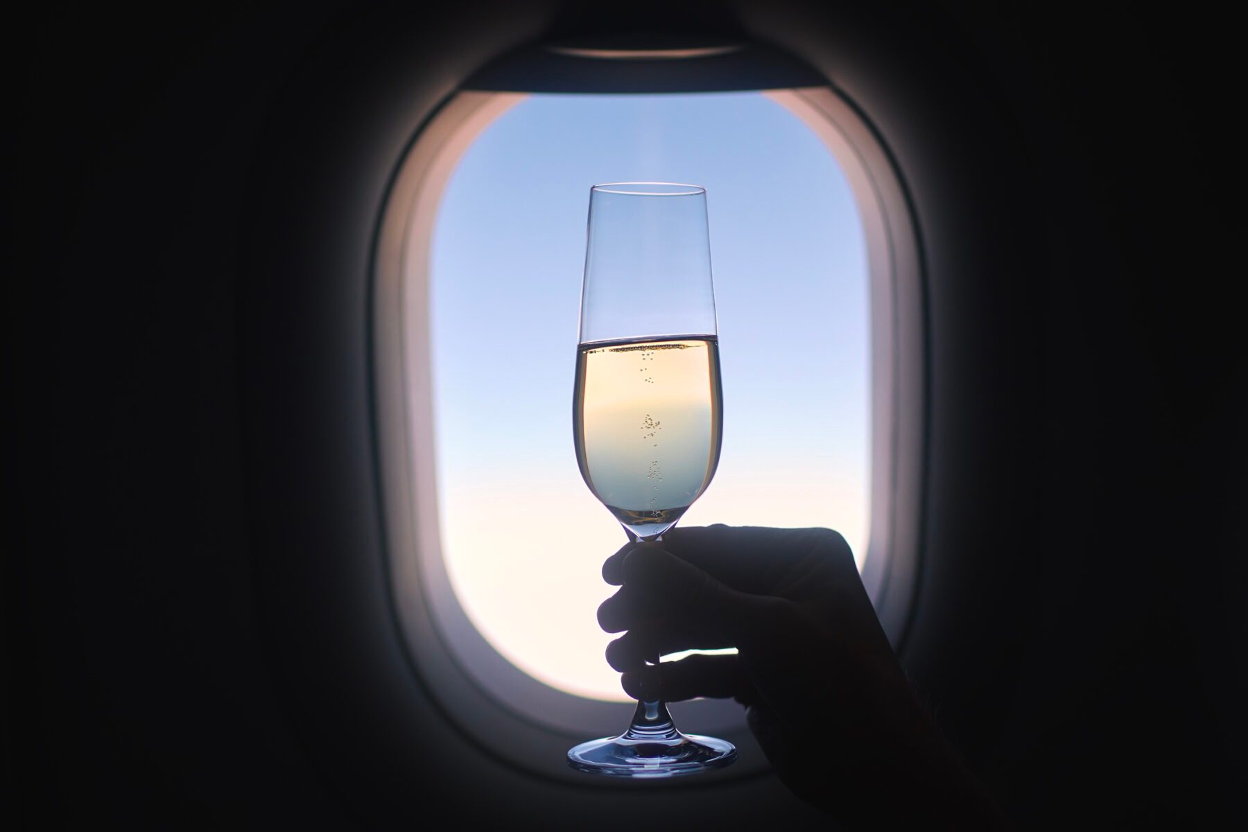 Here’s What Really Happens to Leftover Champagne on Airplanes