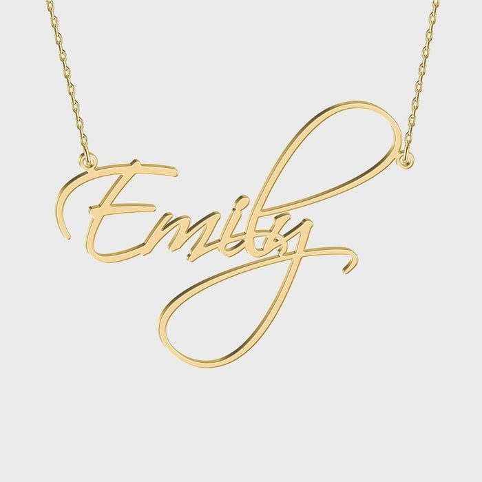 Gold necklace displays the name 