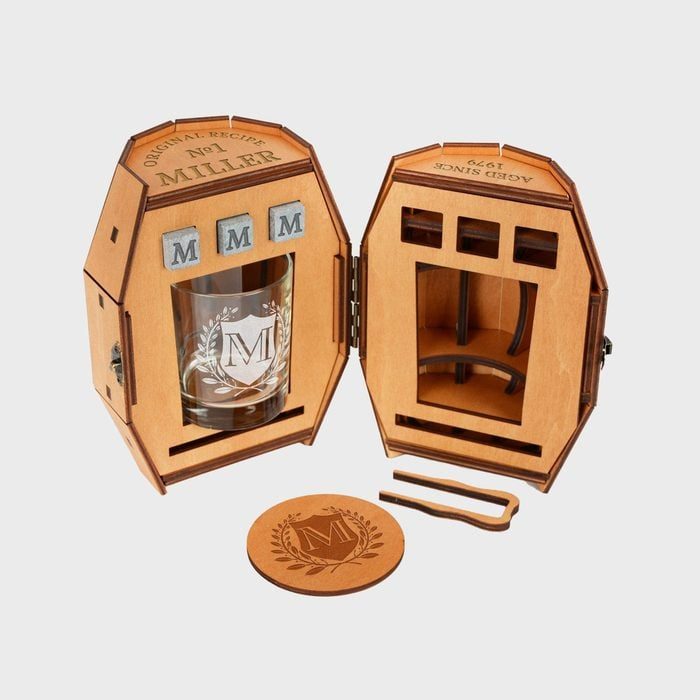Wooden box holds a glass with 