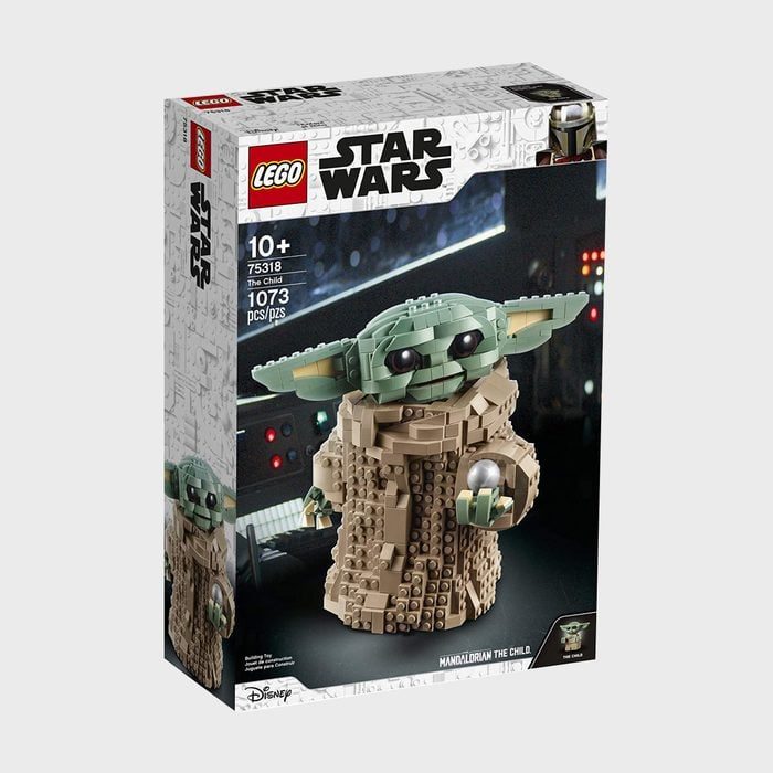 LEGO baby alien figure displayed on a box, surrounded by a Star Wars-themed space background. Text reads, 