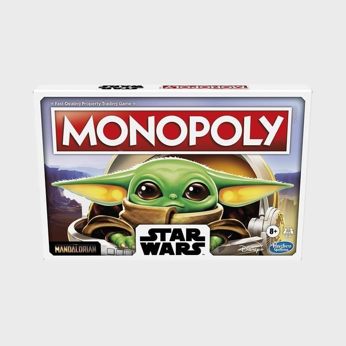 The box features Monopoly game showcasing a character from Star Wars, Mandalorian, with branding and recommended for ages 8+, by Disney and Hasbro.