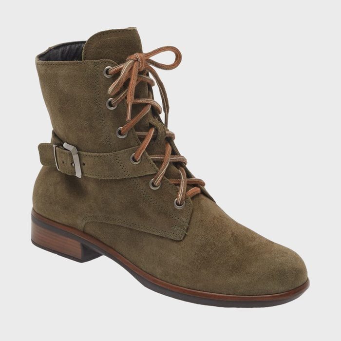 A brown suede ankle boot with laces and a buckle detail, set against a plain white background.