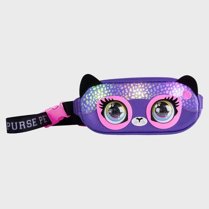 A purple cat-themed purse with large eyes, pink accents, and decorative ears, displayed against a plain background; text reads 