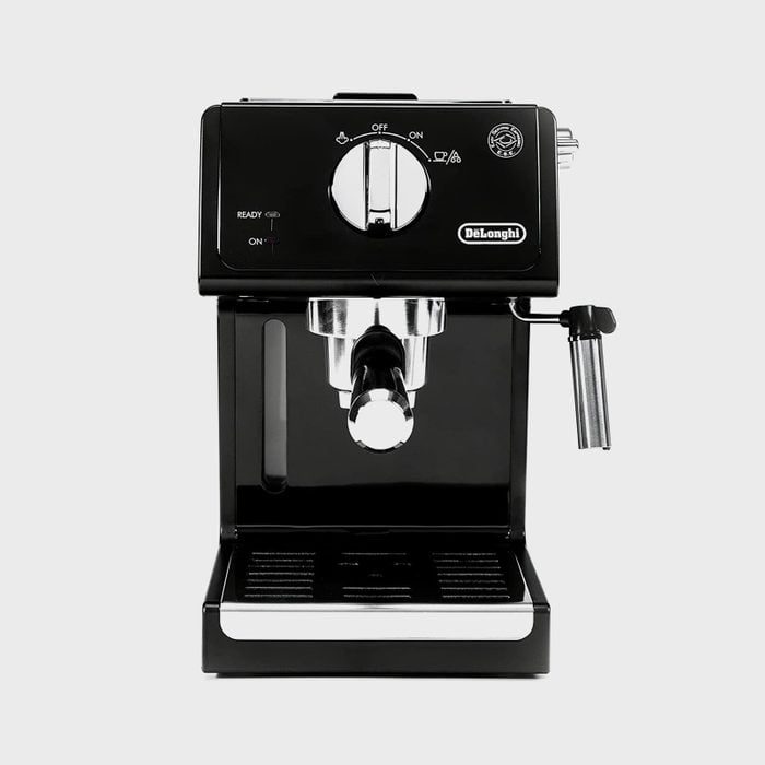 Espresso machine sits idle; black, sleek design with a central spout and a side frothing wand; branded 