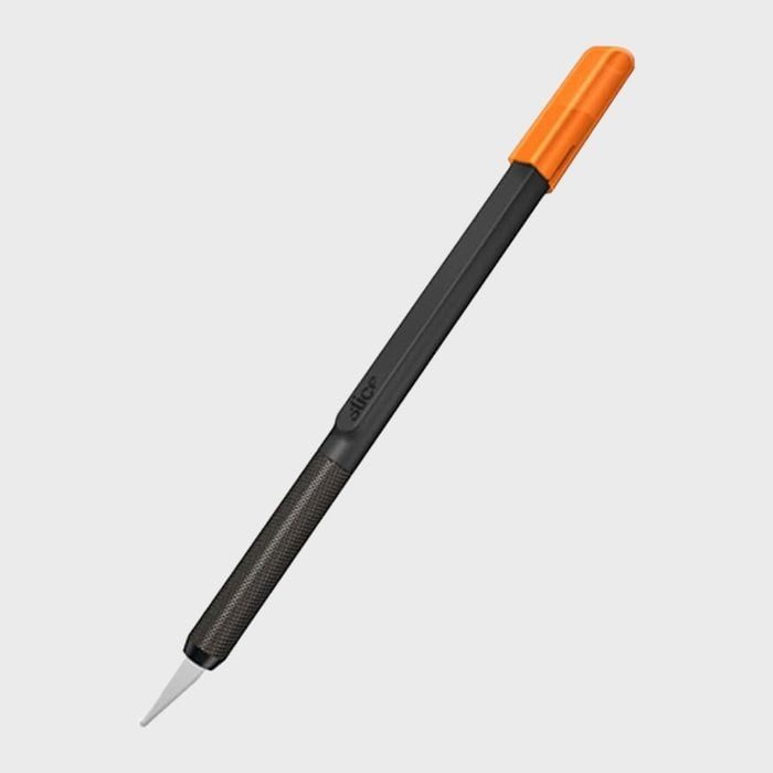 Utility knife with gray handle, orange cap in a plain background. Text reads 