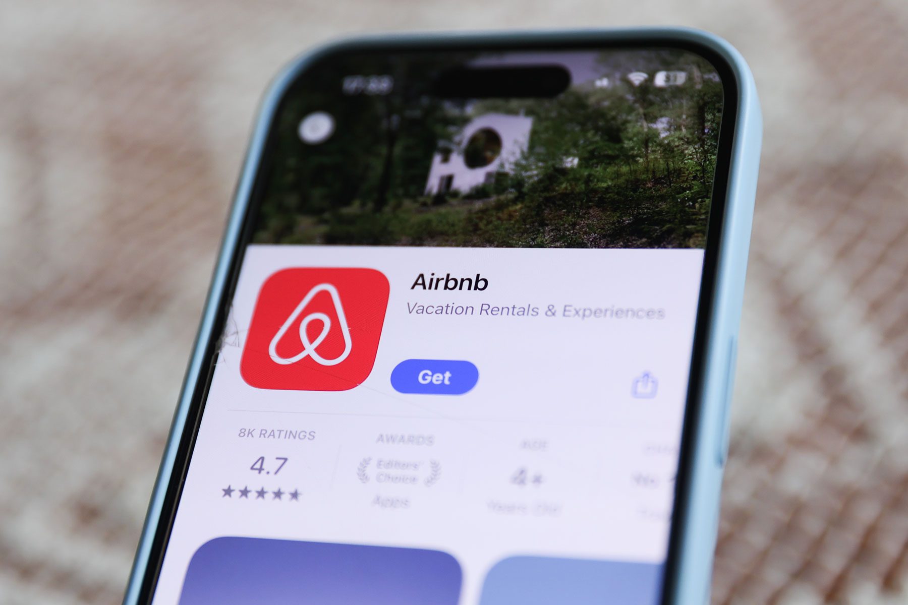 Airbnb on App Store on a phone screen