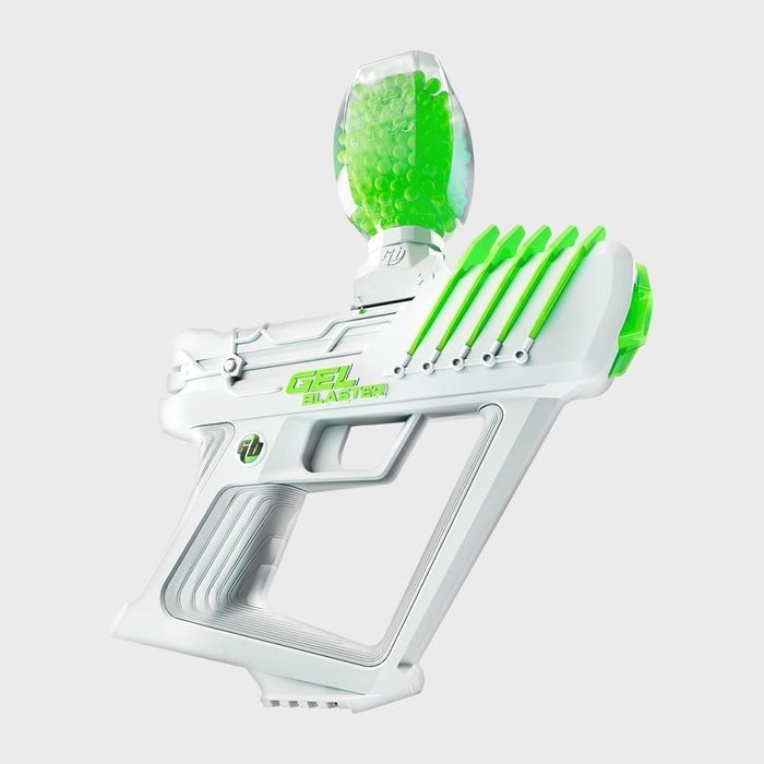 White gel blaster with glowing green accents, holds gel beads, displayed against a plain background.