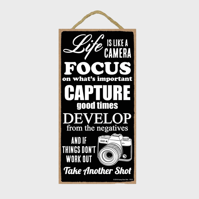Plaque displays camera metaphor for life: 