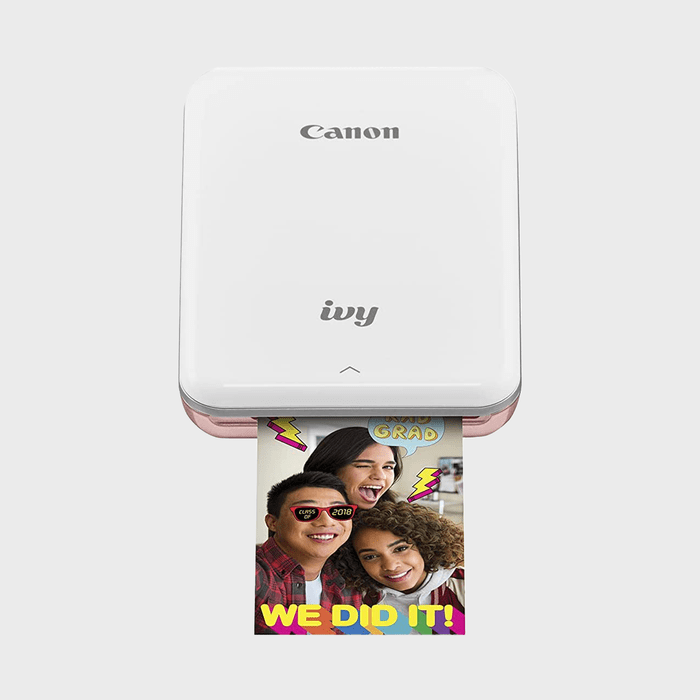 A compact Canon Ivy printer produces a colorful 