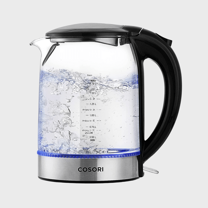 Electric kettle boiling water, emitting blue light, with measurement markings and labeled 