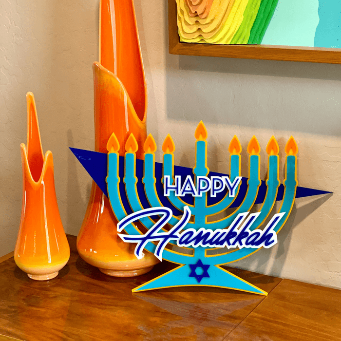 A colorful menorah sign saying 