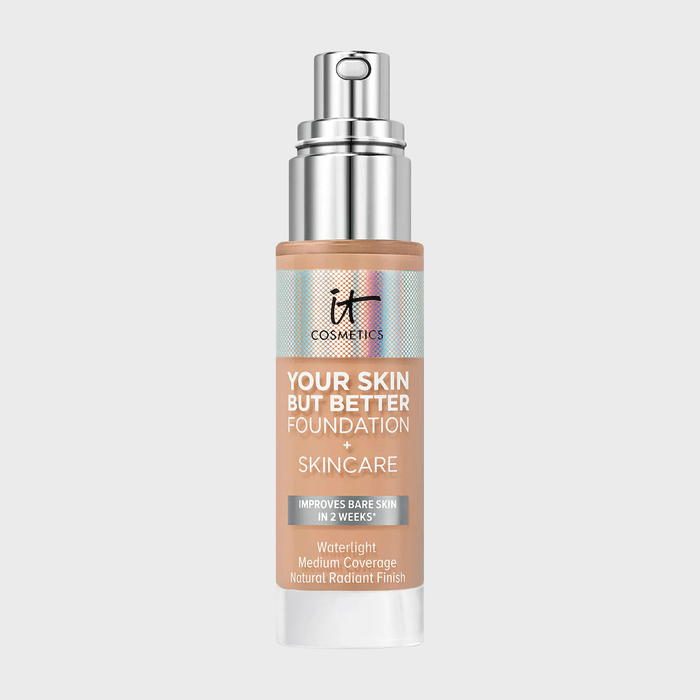 Bottle displays foundation with pump, labeled: â€œYour Skin But Better Foundation + Skincare.â€ Claims: waterlight, medium coverage, natural radiant finish. Silver cap, white background.