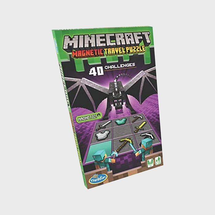 Puzzle box depicting a pixelated dragon over a grid, labeled 