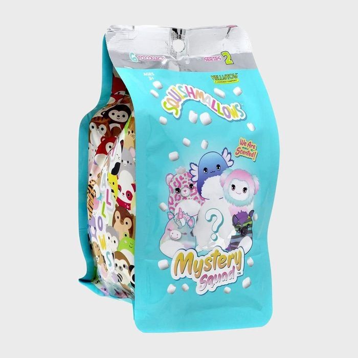 A teal package displays colorful cartoon characters and text: 