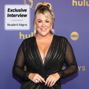 Smiling woman poses in dazzling black dress, against a purple backdrop featuring Hulu and ABC logos. Text reads: 