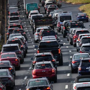 Traffic jam of cars on a four-lane highway