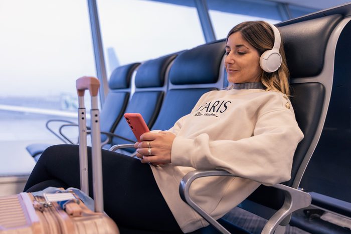 woman in loose comfortable clothing at airport