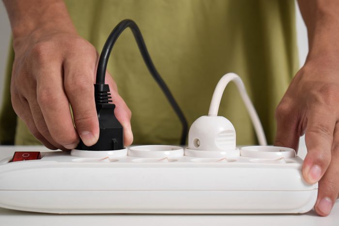 man using power strip
