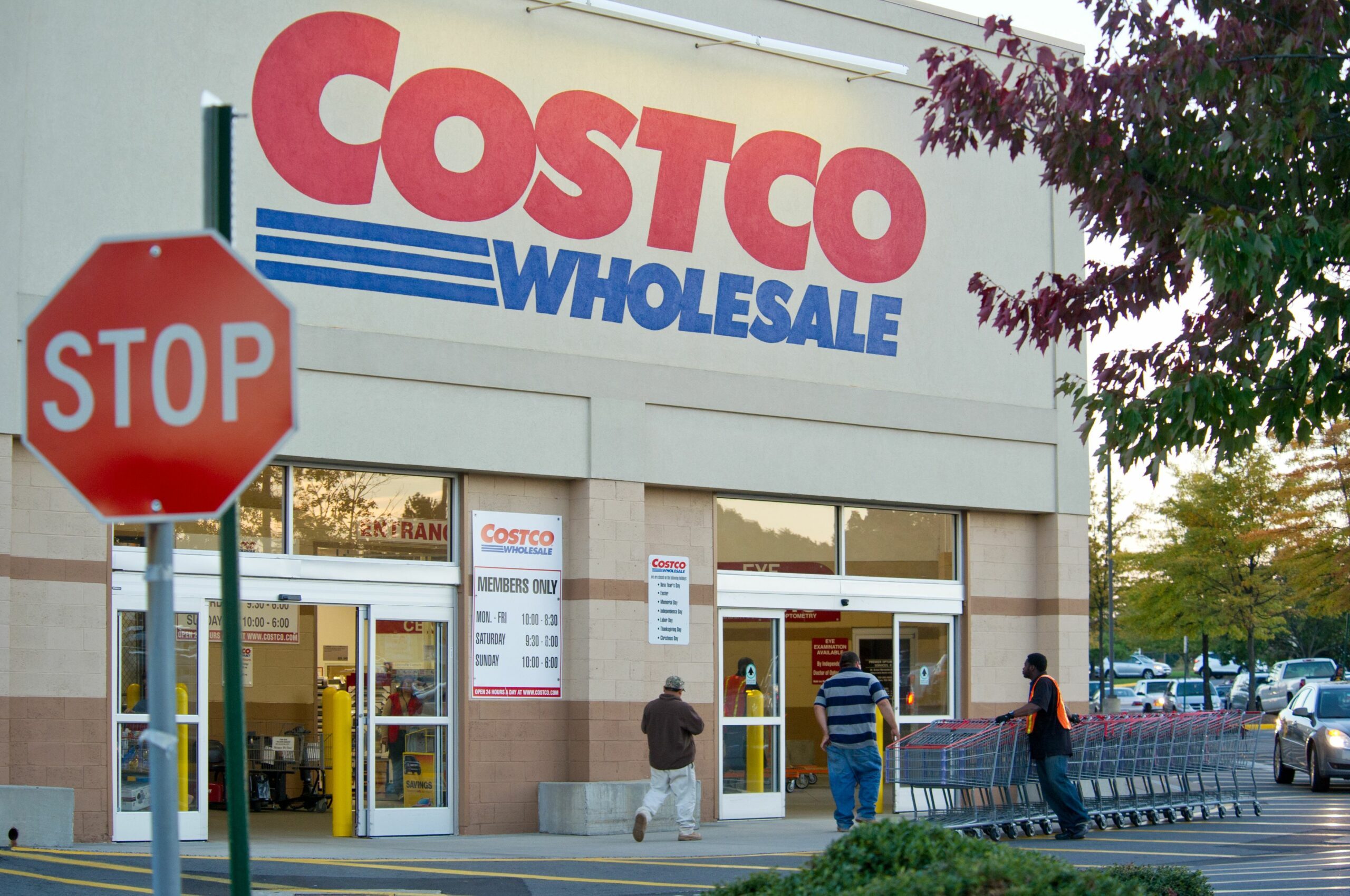 Entrance of Costco showing opening hours