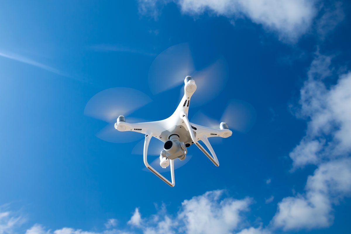 Drone Fly In The Blue Sky