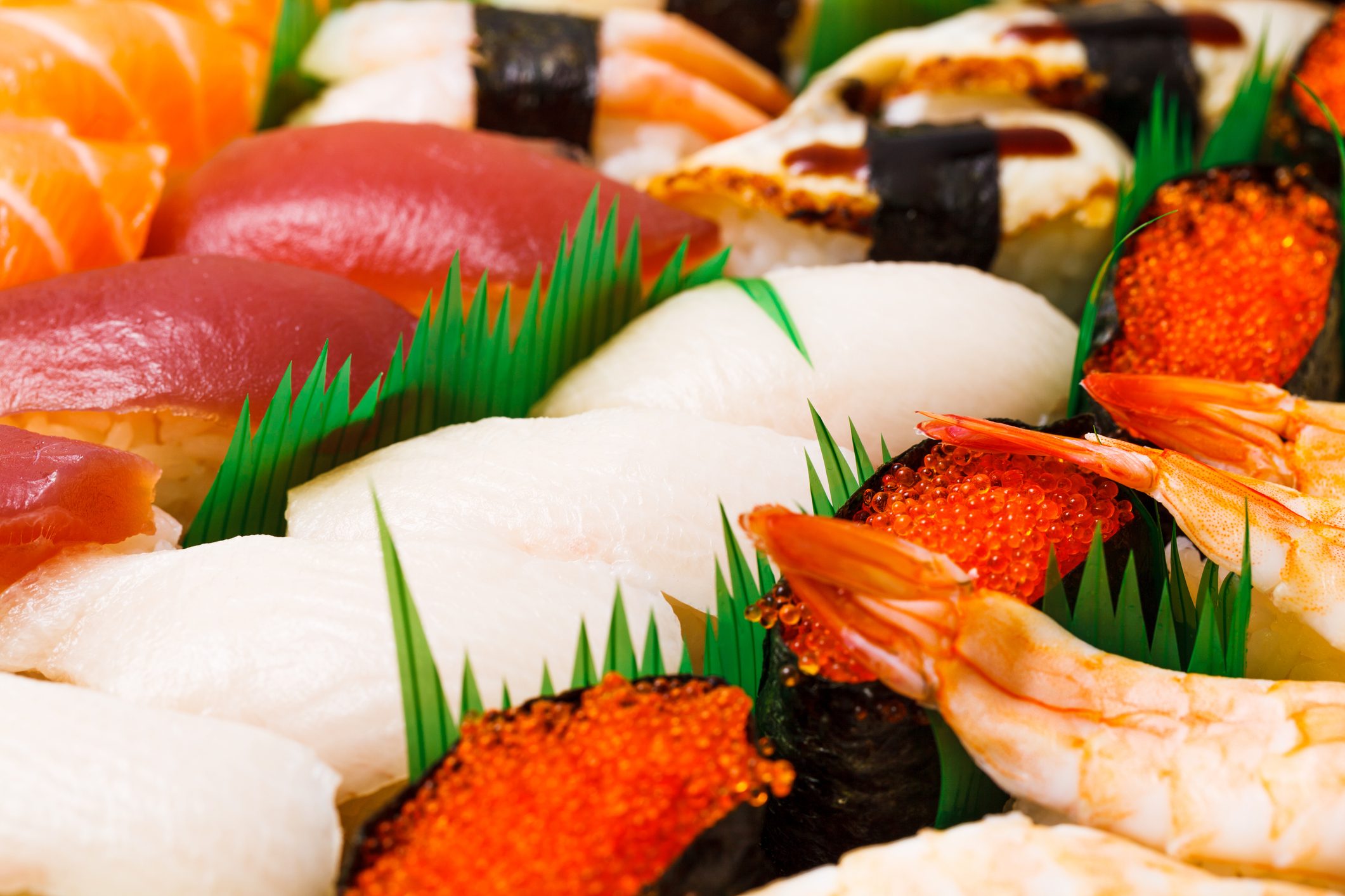 Japanese sushi with plastic grass separating the pieces