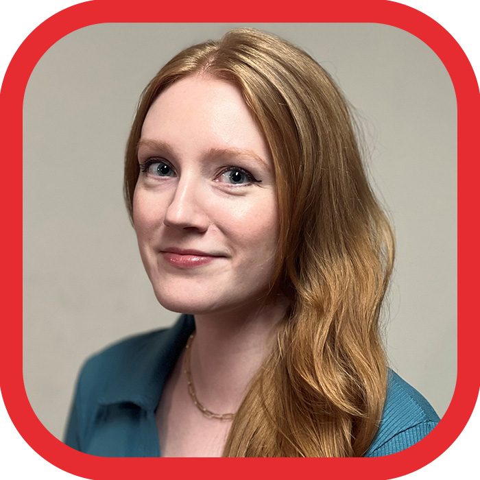 A person smiles against a plain white background, framed within a rounded red border.