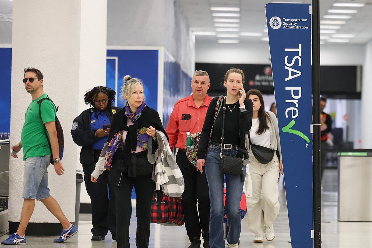 Peoples passing through the TSA precheck lines