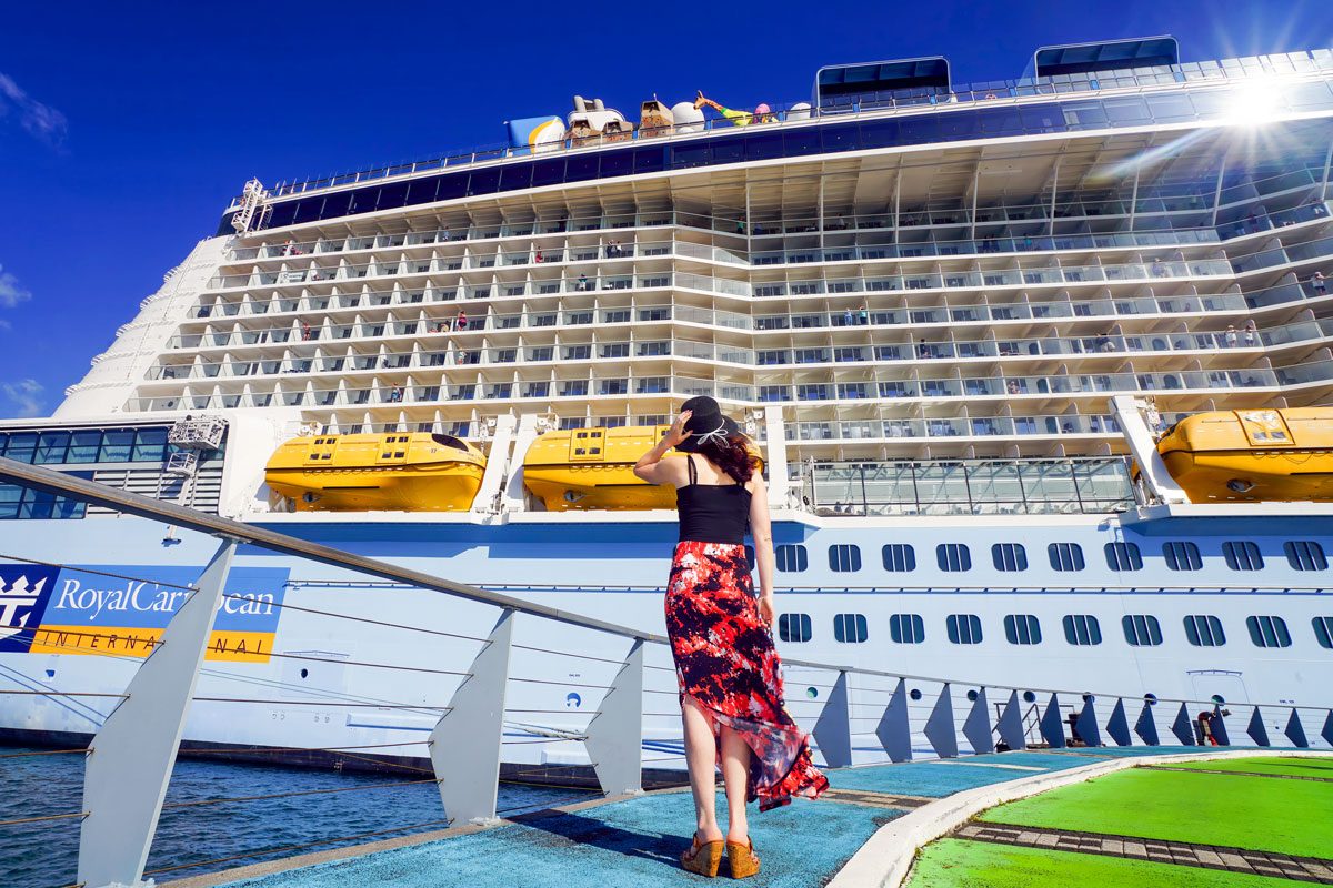 Woman Looking At A Cruise Ship