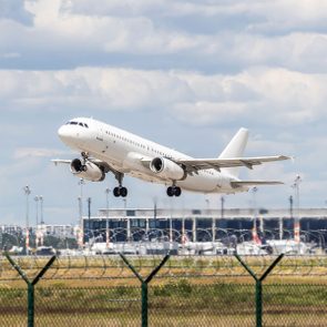 Airplane taking off at an airport