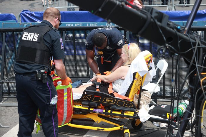 woman receiving first aid at an eating contest