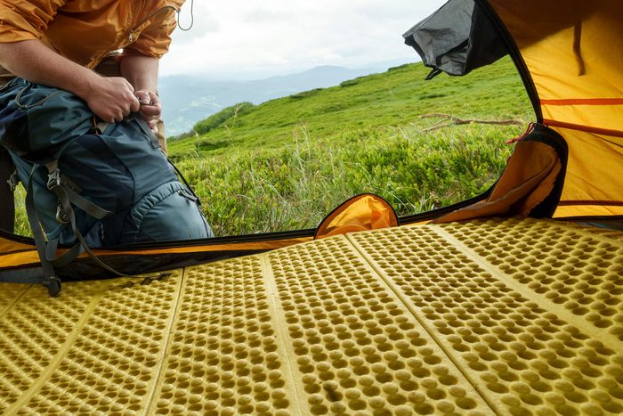 tent floor lined with foam tiles