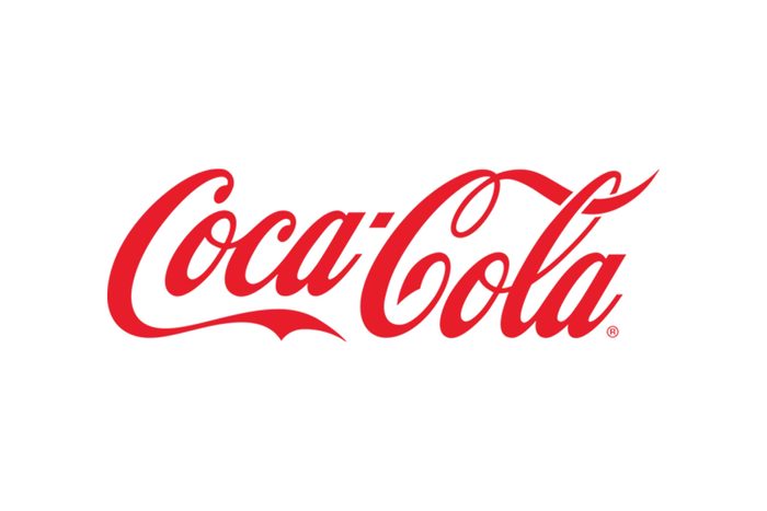 Stylised letters thats says "Coca Cola" in bright red colors set against a white background.