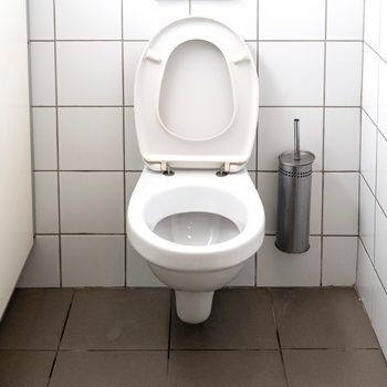 Opened toilet cubicle at public toilet
