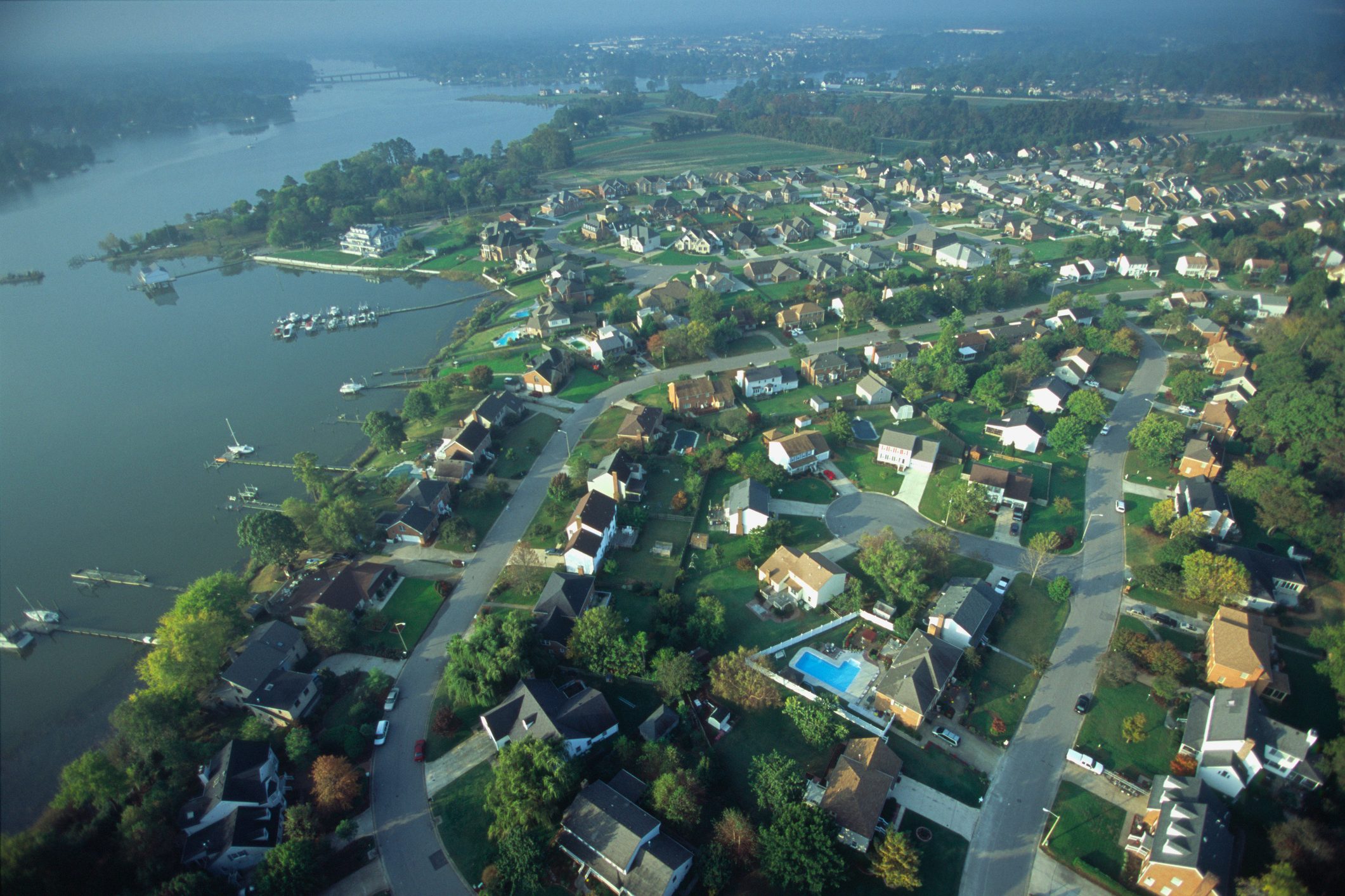 Aerial of housing development in Chesapeake, VA, on a river