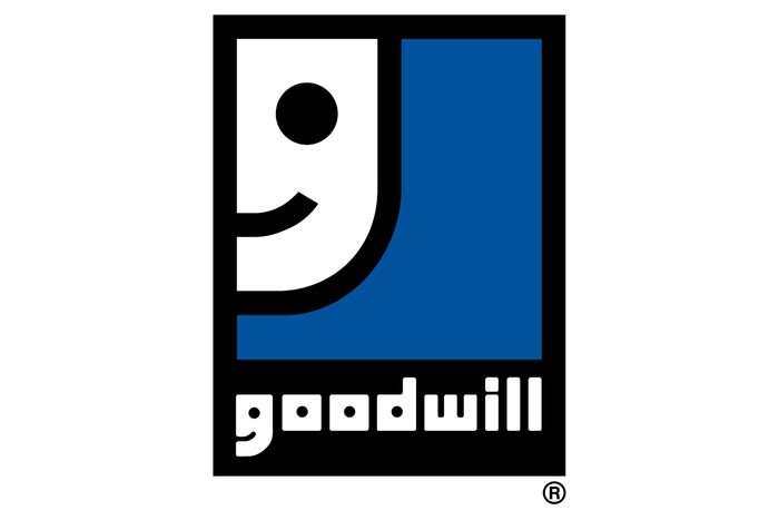 Logo displays a stylized smiling face on a blue background, with the word "goodwill" in lowercase underneath.
