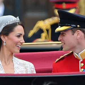 Prince William and Catherine prepare to begin their journey by carriage procession to Buckingham Palace