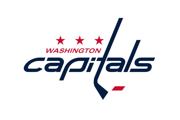 Washington Capitals logo in colors of blue and red with three stars on top and the letter T suggestive of a hockey.
